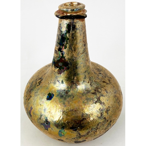 687 - ENGLISH SEALED SHAFT & GLOBE WINE BOTTLE. 8.1ins tall, c. 1665-70. This second bottle bears delightf... 