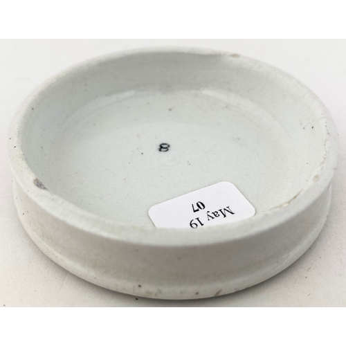 637 - LORIMER CHERRY TOOTH PASTE POT LID. 
 2.5ins diam. Smaller variant to previous lot. Very slight bott... 