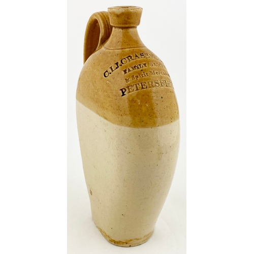 668 - PETERSFIELD SPIRIT FLASK.  10.5ins tall, t.t. tan, flat sided flagon, rounded shoulders, rear handle... 