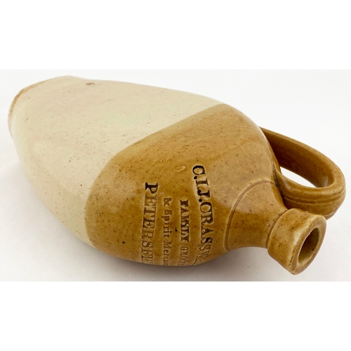 668 - PETERSFIELD SPIRIT FLASK.  10.5ins tall, t.t. tan, flat sided flagon, rounded shoulders, rear handle... 