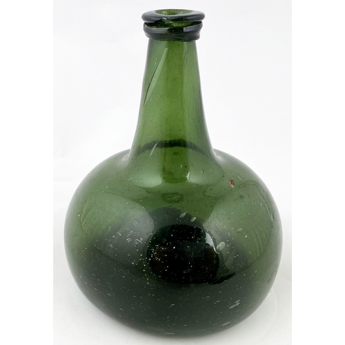 675 - EUROPEAN ONION BOTTLE. 6.75ins tall.Bright/ deep green glass, c. 1705-10. Most likely of European ma... 