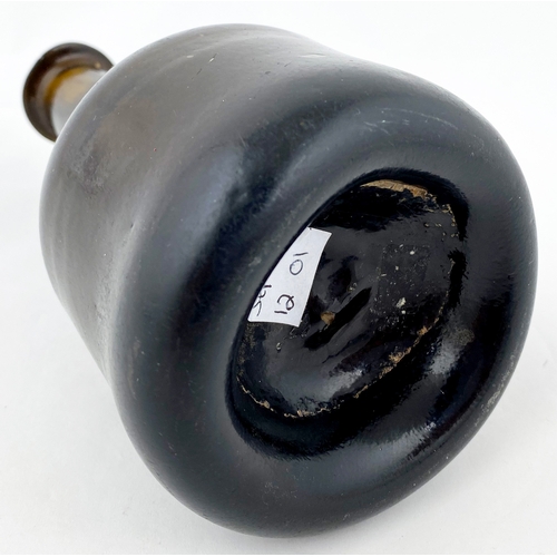 676 - EARLY ENGLISH SPLIT SIZE MALLET WINE BOTTLE. 6.4ins tall. Black/ dark amber glass. Long neck with st... 