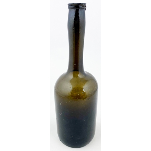 678 - LADIES LEG WINE BOTTLE. 11.4ins tall. Mid green glass, cylindrical shape, free blown, pontilled, nec... 