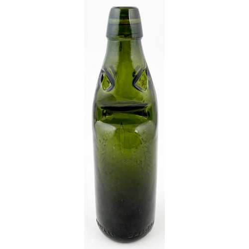 558 - OXFORD CODD BOTTLE.  9.4ins tall, 10oz, deep/ dark green glass. 4 neck retaining lugs. Heavily embos... 