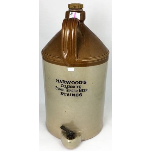 251 - STAINES FLAGON. 17ins tall, t.t, handled. HARWOODS/ CELEBRATED/ STONE GINGER BEER. Double sided tran... 