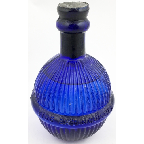 306 - HARDEN STAR FIRE GRENADE. 6.5ins tall, cobalt blue, embossed. Complete with contents. (9.5/10)