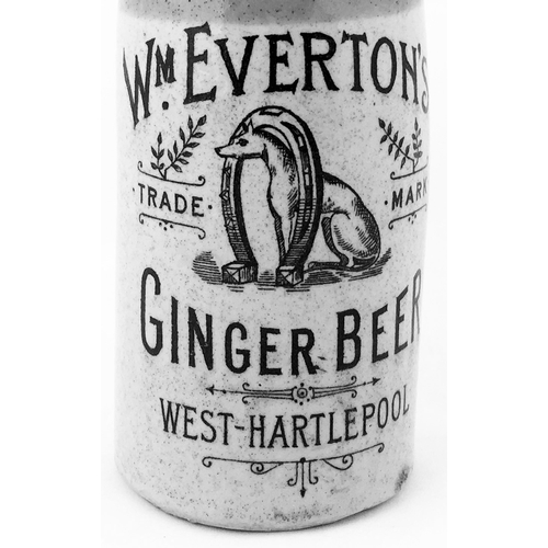 24 - WM EVERTONS HARTLEPOOL GINGER BEER BOTTLE 8ins tall, ch., t.t., cork closure. Large pictorial trade ... 