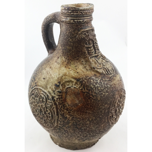 29 - BELLARMINE JUG 8.3 ins tall. Salt glaze ranges from very dark browns to light. Standard bulbous body... 