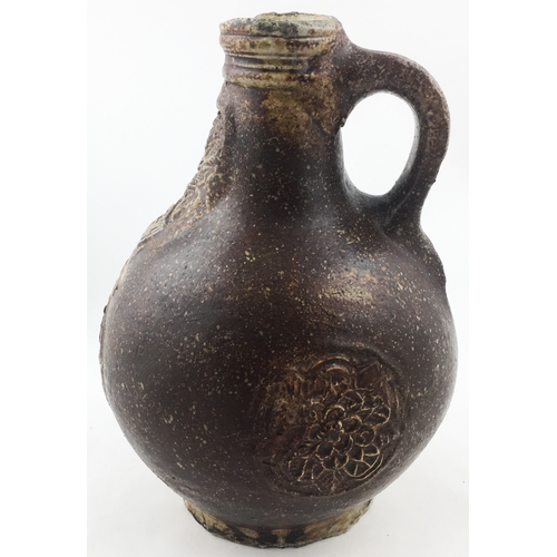 29 - BELLARMINE JUG 8.3 ins tall. Salt glaze ranges from very dark browns to light. Standard bulbous body... 