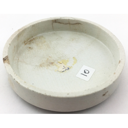 48 - JAMES ATKINSON BEARS GREASE POT LID. 3.1ins diam. First of three Atkinsons single bruin pictorial li... 