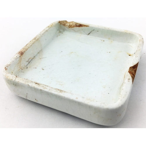 65 - LLANELLY TOOTH PASTE POT LID. 2.4ins square. Described in ‘Historical Guide to Advertising Pot Lids’... 