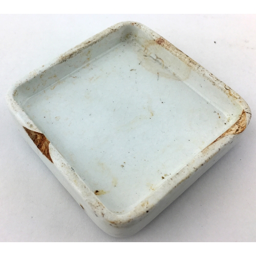 65 - LLANELLY TOOTH PASTE POT LID. 2.4ins square. Described in ‘Historical Guide to Advertising Pot Lids’... 