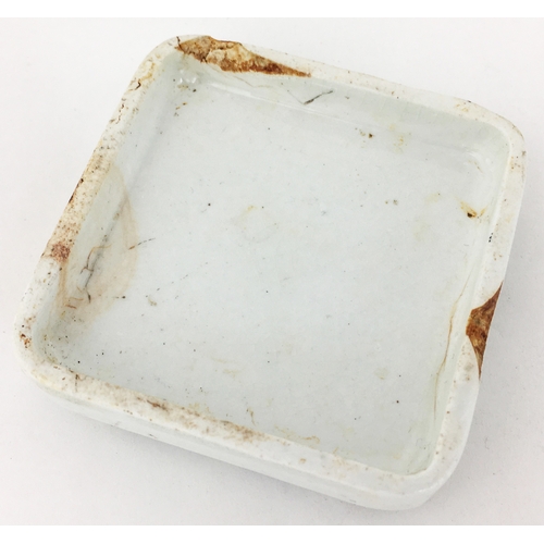 65 - LLANELLY TOOTH PASTE POT LID. 2.4ins square. Described in ‘Historical Guide to Advertising Pot Lids’... 