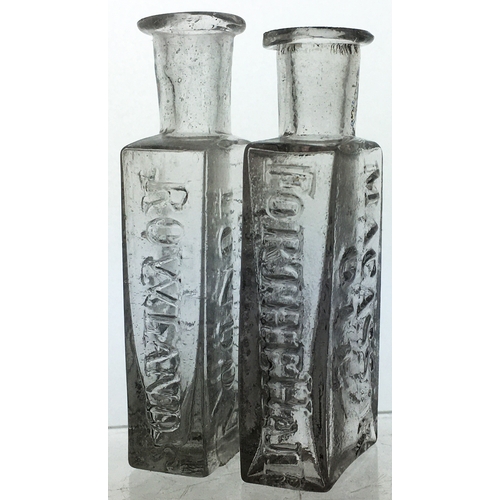 79 - LONDON PONTILLED MACASSAR OIL BOTTLES. Tallest 3.5ins, clear flint glass, wonderful rolled flared li... 