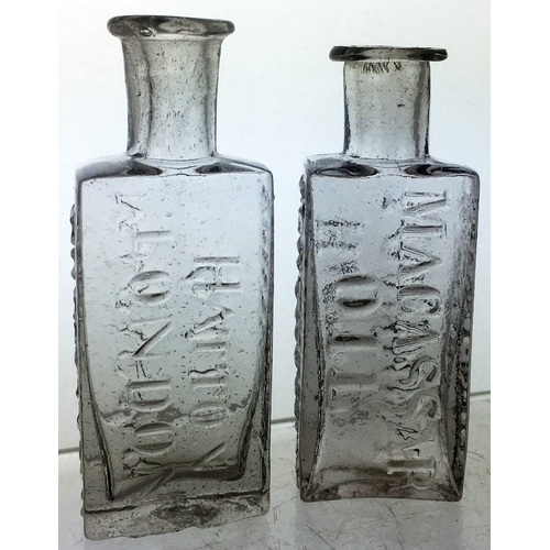 79 - LONDON PONTILLED MACASSAR OIL BOTTLES. Tallest 3.5ins, clear flint glass, wonderful rolled flared li... 