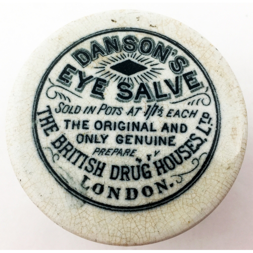 110 - 2.15ins diam. Flat topped lid with prominent wide rim. ‘DANSON’S/ EYE SALVE/... THE BRITISH DRUG HOU... 