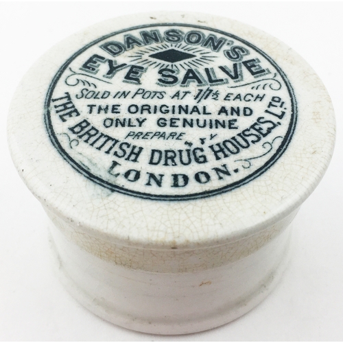 110 - 2.15ins diam. Flat topped lid with prominent wide rim. ‘DANSON’S/ EYE SALVE/... THE BRITISH DRUG HOU... 