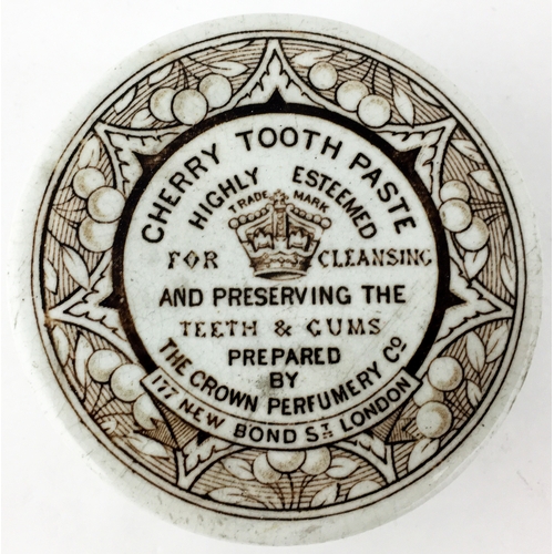 83 - CROWN PERFUMERY CHERRY TOOTH PASTE POT LID. (APL p283). 3.2ins diam. An early flat topped example of... 