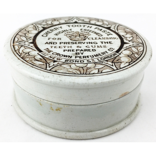 83 - CROWN PERFUMERY CHERRY TOOTH PASTE POT LID. (APL p283). 3.2ins diam. An early flat topped example of... 