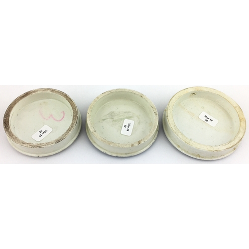 90 - DWARD TAYLOR MANCHESTER POT LID TRIO. Largest 3ins diam. Variations on the well known tooth paste li... 