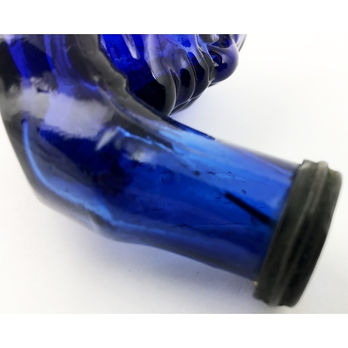 124 - BENJAMIN FRANKLIN FIGURAL TEAKETTLE FOUNTIAN INK BOTTLE. 4.25ins long, 2.75ins tall. Medium cobalt b... 