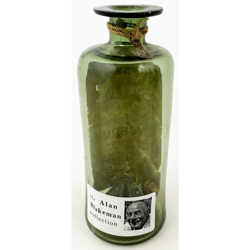 127 - FREEBLOWN LABELLED PHIAL. 4.3ins tall. Wonderful cylindrical early glass phial in a smokey green gla... 