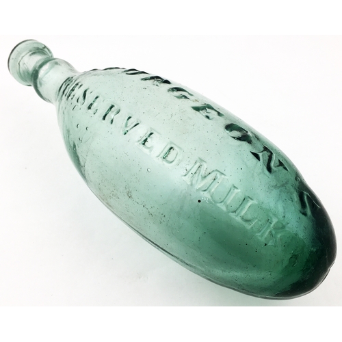 128 - STURGEON’S PRESERVED MILK. 9.9ins long, deep aqua glass round bottomed hamilton style shape with a v... 