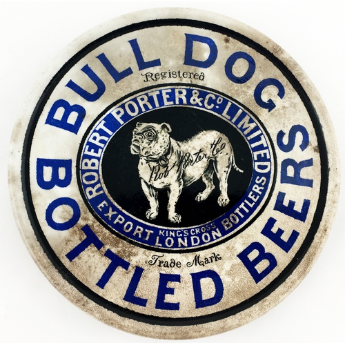 133 - ROBERT PORTERS BULL DOG BOTTLED BEERS COASTER.. 6.1ins diam. A blue and black design effectively set... 