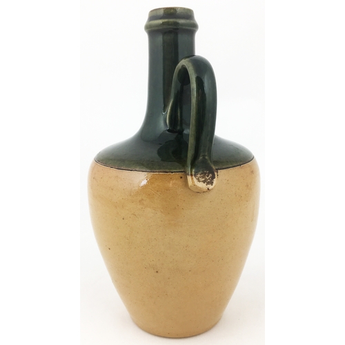 136 - DEWARS PERTH WHISKY JUG.  (WG p55, B130). 7.9ins tall. Green top, lower mid brown salt glaze, rear h... 