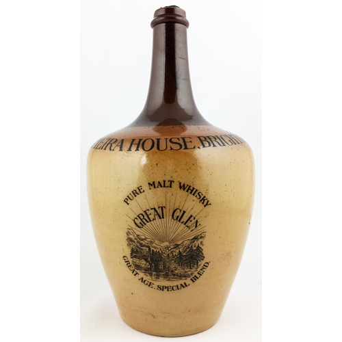 136 - DEWARS PERTH WHISKY JUG.  (WG p55, B130). 7.9ins tall. Green top, lower mid brown salt glaze, rear h... 