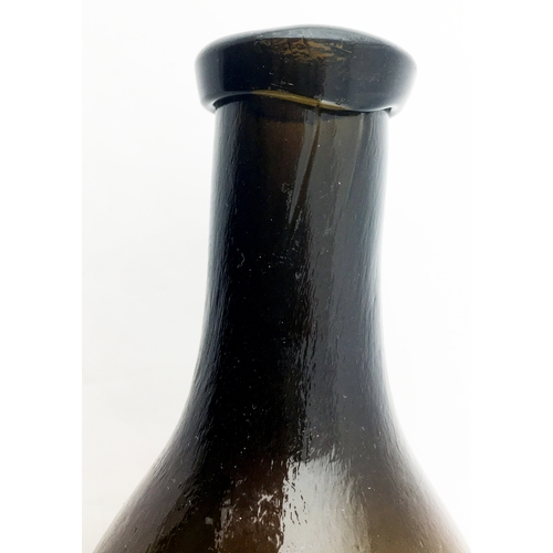 146 - FULLERS PATENT OVATE. 7.3ins long. Dense black glass very early hamilton shape, variating to lighter... 