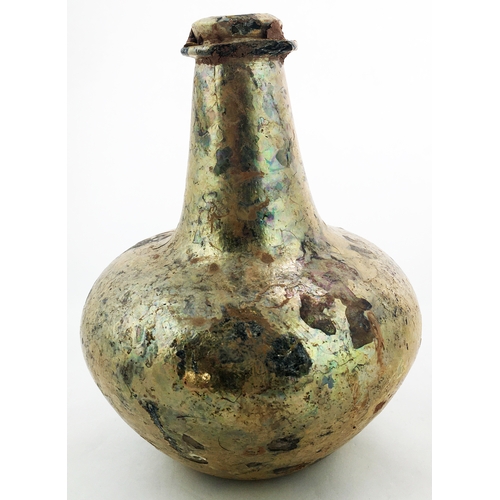 147 - . ENGLISH SEALED SHAFT & GLOBE WINE BOTTLE.  8.3ins tall, c.1665-70. This is complete shaft and glob... 