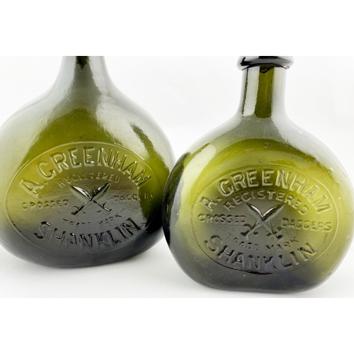 4 - SHANKLIN BLADDER WINE BOTTLES. Tallest 9.25ins, screw stopper, dark green/ black glass. âGreenham.... 