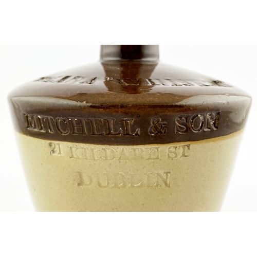 342 - DUBLIN IMPRESSED WHISKEY JUG. 8ins tall. T.t, rear handle, EBLANA WHISKEY/ MITCHELL & SON. Lip nibbl... 