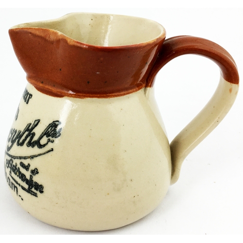 124 - OLDHAM WINE & SPIRIT MERCHANT SMALL WATER JUG. 3.3ins tall. T.t., waisted below neck. Price p.m. Exc... 