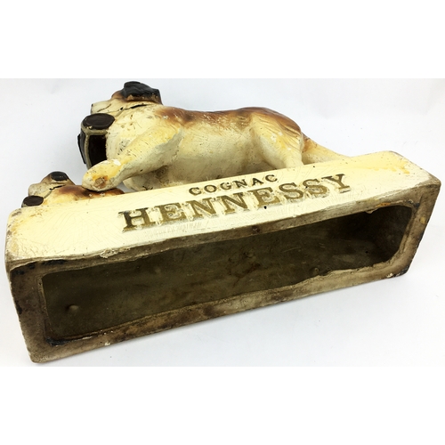 4 - COGNAC HENNESSY ADVERTISING STATUETTE. 12 x 10.5ins.  A fabulous large shop window type early rubboi... 