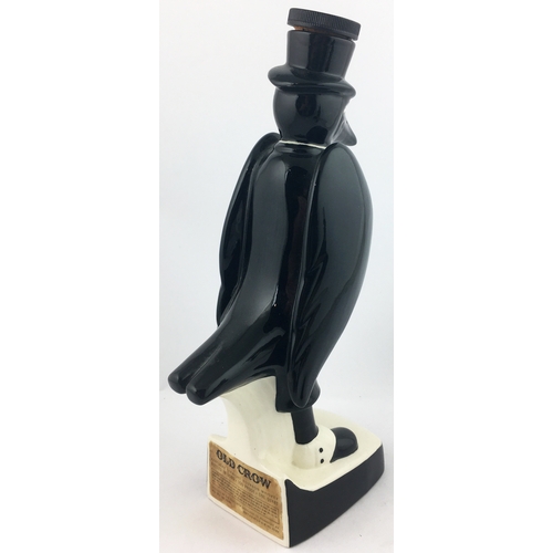 46 - OLD CROW WHISKY DECANTER. 13.5ins tall. Amusing dapperly dressed figural crow, stopper in hat. Royal... 