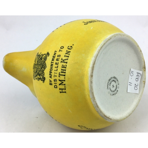 63 - JOHN JAMESON THREE STAR WHISKEY WATER JUG. 4.2ins tall. Matt yellow body (worn, best side shown - se... 