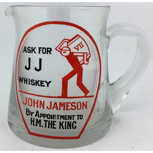 64 - JOHN JAMESON WHISKY WATER JUG. 4ins tall. Clear glass with a slightly flared top. Stylish Art Deco p... 