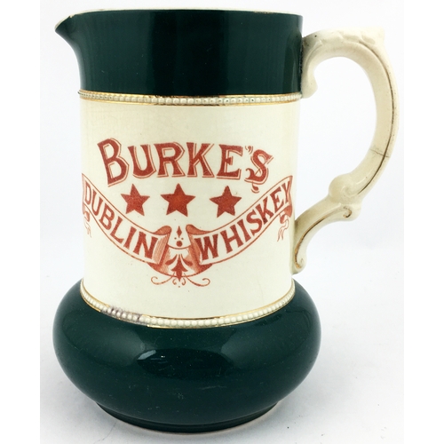 66 - BURKES DUBLIN WHISKY BAR TOP JUG. 6.6ins tall. Straight sided design with bulbous base area, both to... 