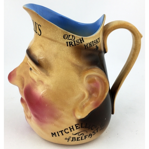 67 - MITCHELLS OLD IRISH WHISKY BELFAST BAR TOP JUG. 6ins tall. Naturalistically coloured jovial gent wit... 