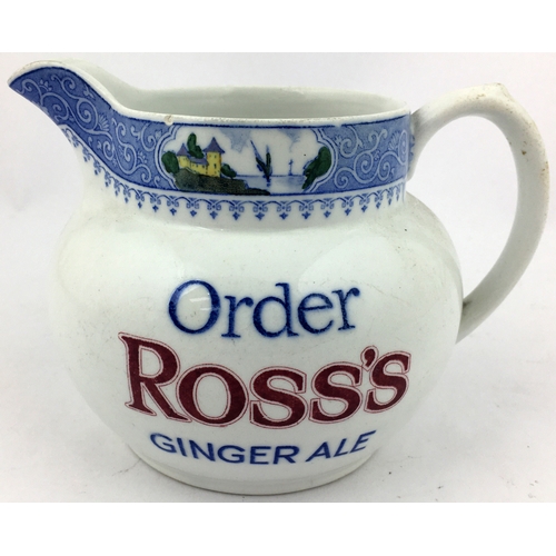 69 - ROSS'S BAR TOP JUG. 4.4ins tall. Decorative blue neck transfer with coloured pictorial scene within.... 