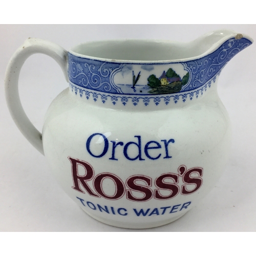 69 - ROSS'S BAR TOP JUG. 4.4ins tall. Decorative blue neck transfer with coloured pictorial scene within.... 