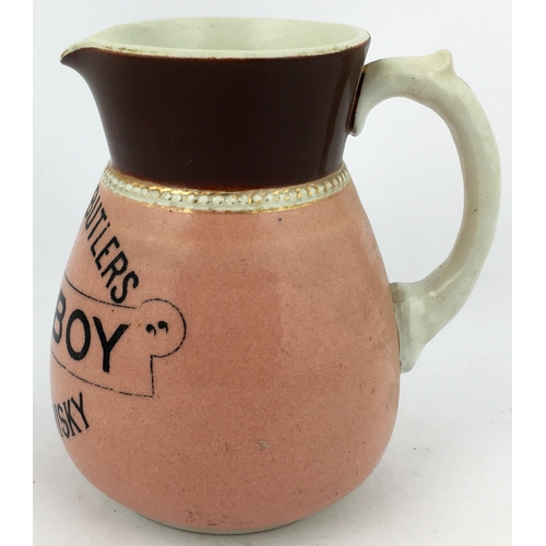 73 - MITCHELL & BUTLERS BALLY BOY OLD IRISH WHISKY WATER JUG. 4.5ins tall. Pink body, black 3 lined trans... 