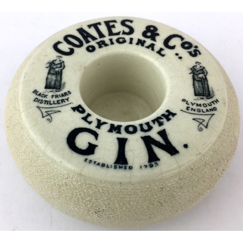 86 - COATES PLYMOUTH GIN MATCHSTRIKER. 4.5ins diam tyre style stroker/ holder with 2 Friar pictorials eac... 