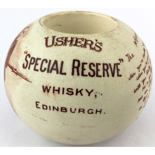 87 - USHERS O.V.G. WHISKY MATCHSTRIKER. 2.7ins tall. Spherical body with flat top. Dark brown transfer al... 