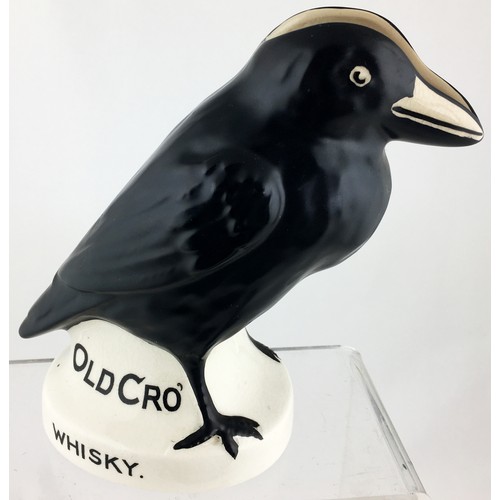 15 - OLD CRO WHISKEY BIRD SHAPED WATER JUG. 6.7ins tall, off white with detailed bird and lettering in bl... 