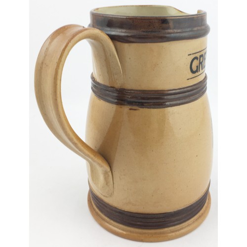 246 - GREENLEES BROTHERS KING EDWARD V11 SCOTCH WHISKY BAR TOP JUG. 6.7ins tall. Mid brown salt glaze with... 