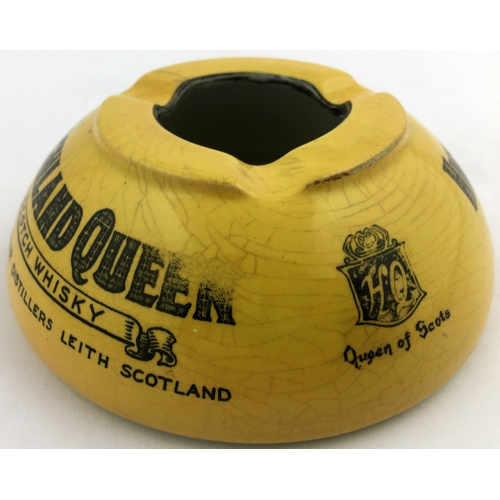 113 - HIGHLAND QUEEN SCOTCH WHISKY ASHTRAY. 4.5ins diam. Mustard coloured dome, main lettering tartan styl... 