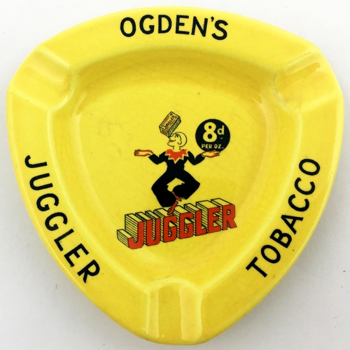 118 - OGDENS JUGGLER TOBACCO ASHTRAY. 4ins triangluar shape. Features red & black juggler pict. to centre,... 